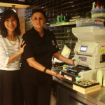 Kimmi Siu Dewar, general manager for Wasabi Warriors, with one of their sushi chefs